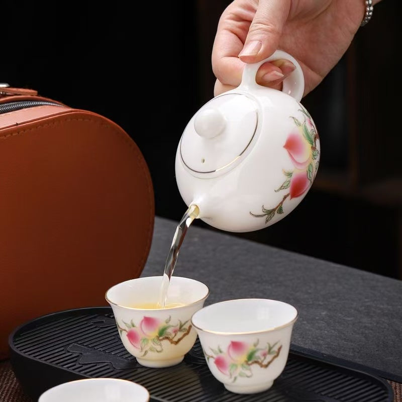 Tea set of Xi Shi Pot made of sheep fat jade